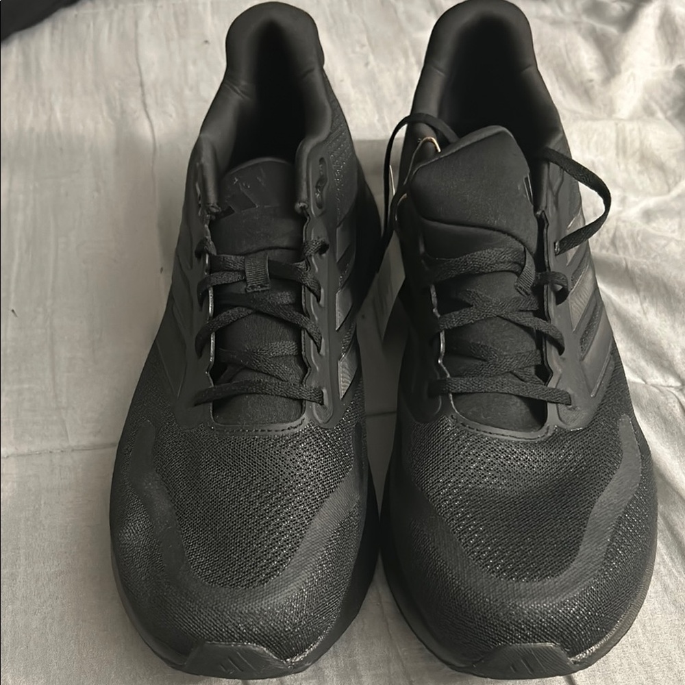Adidas Black Athletic Shoes with Breathable Mesh and Durable Sole